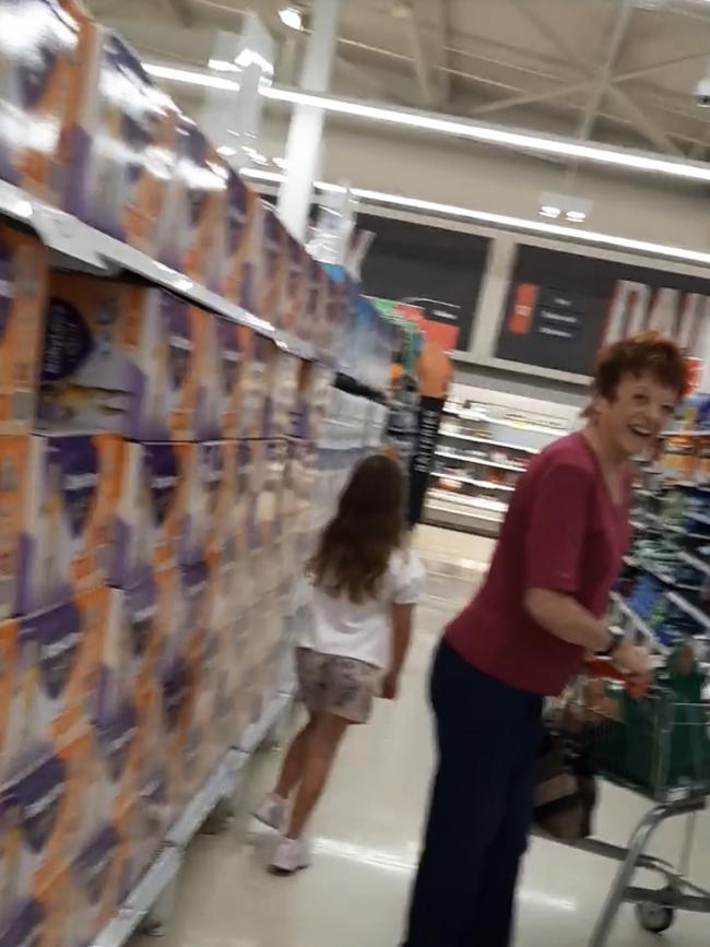 A still from one of the toilet paper song videos that Sally Loughnan films at her local Coles and posts online.