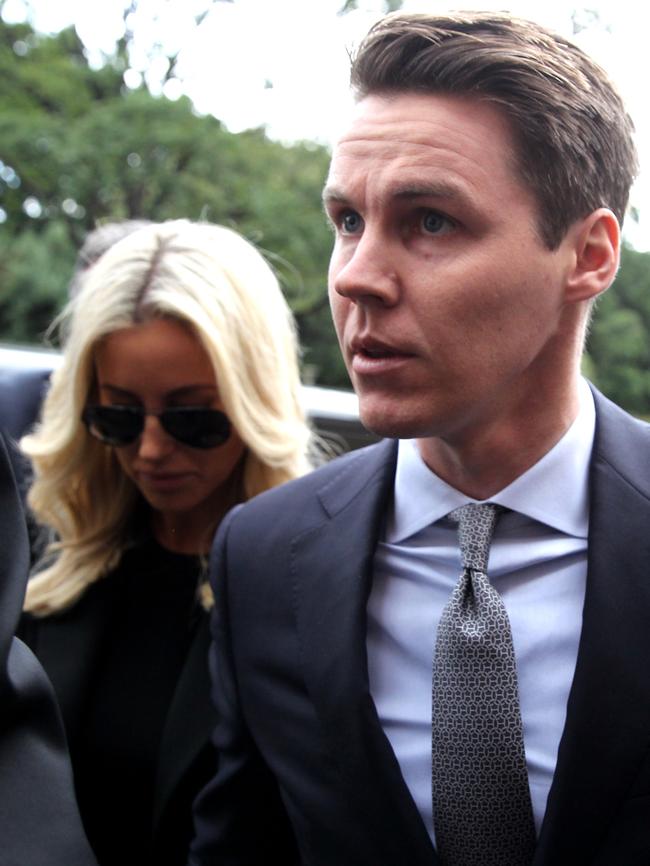 Pic of Oliver Curtis and wife Roxy Jacenko arriving at St James Rd Supreme Court for his sentencing for Insider Trading