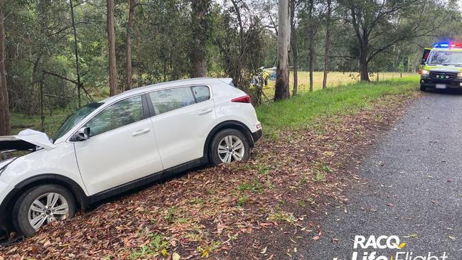 A woman whose car crashed into a tree east of Gympie early Monday morning was flown to Brisbane in a serious condition. Photos: Lifeflight