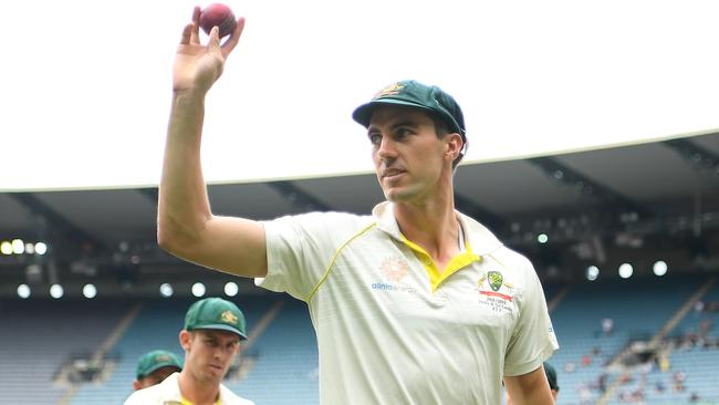 Pat Cummins comes off the ground after snaring six wickets. Pic: Getty Images