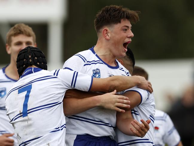 Riley Allen celebrating his try with teammates during the NSW U15 Combined Catholic Colleges v Combined Independent Schools game of the State Rugby League Tri-Series held at St Mary's Leagues Stadium. Picture: Jonathan Ng