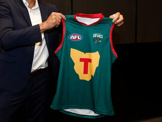 DEVONPORT, AUSTRALIA - MARCH 18: Matthew Richardson poses with The Tasmania Devils inaugural jumper during the Tasmania Football Club Launch at Paranaple Convention Centre on March 18, 2024 in Devonport, Australia. (Photo by Michael Willson/AFL Photos via Getty Images)