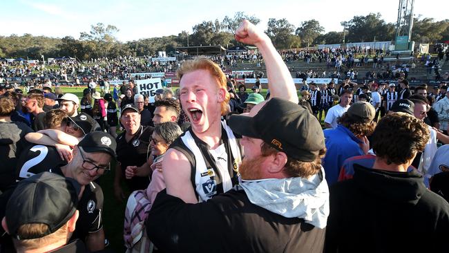 The Magpies celebrating after their premiership victory. Picture: Yuri Kouzmin