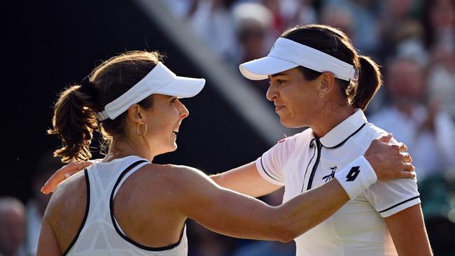 Tomljanovic (R) is congratulated by French veteran Alize Cornet. Picture: AFP