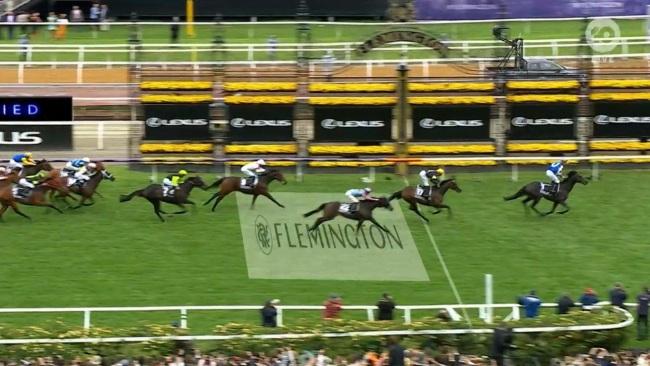 Gold Trip is the first past the famous Flemington post.