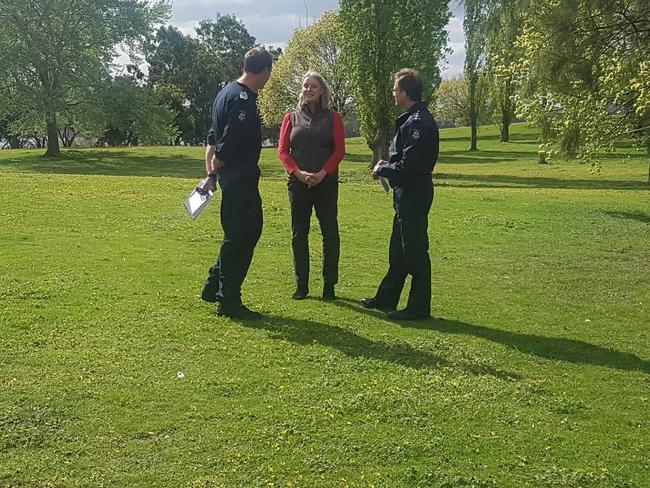 Christine Forster talks with police out at the search for husband John Forster. Picture: Andrea Hamblin