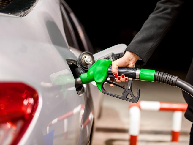 Generic photo - Petrol pump. woman pumping petrol in car at petrol station. Picture: iStock