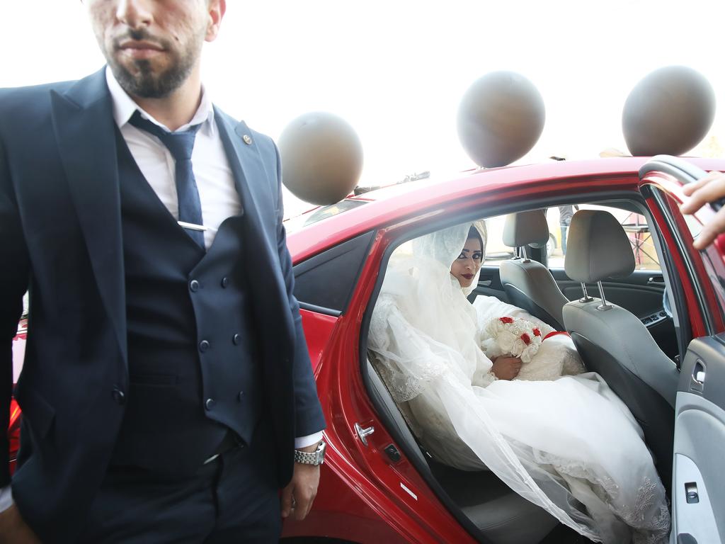 Groom Mohammed Tahir and bride Ilham Bashar in Mosul. Picture: Ella Pellegrini