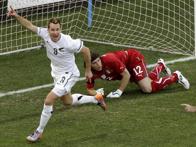 ... and scoring for New Zealand against Italy at the 2010 World Cup. Picture: AP Photo/Michael Sohn