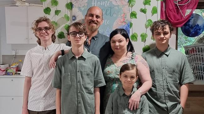 Sam and Anthony Reimers pictured with four children at their Caravonica home before it was inundated by flooding of the Barron River two weeks ago. Picture: Supplied