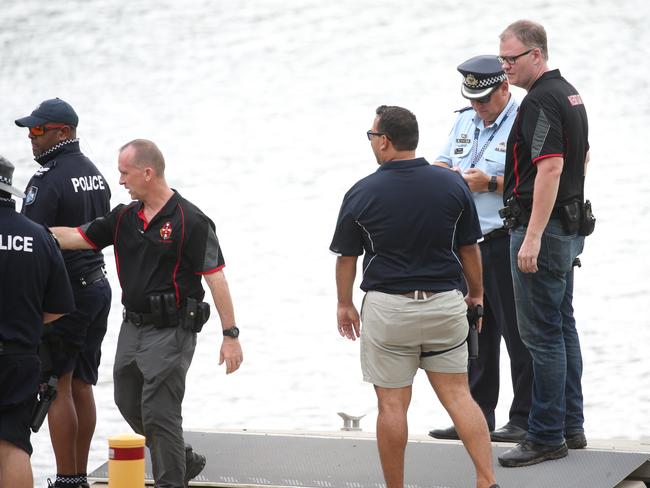 Police at the scene of the shooting at Thomatis Creek, just north of Cairns airport. Picture: Stewart McLean