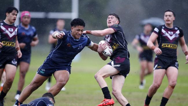 Cody Hamilton of Marsden and Jacob Taulani of Redcliffe. (Image/Josh Woning)