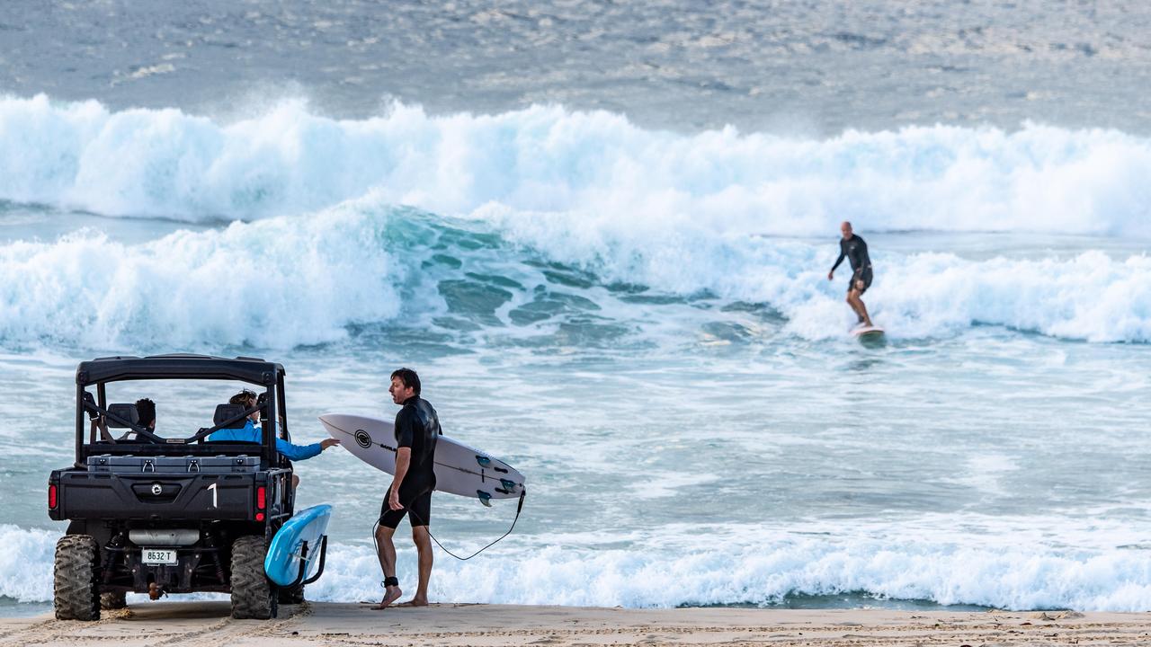 Surfers ordered to stop surfing by lifeguards at Bondi Beach on Sunday. Picture: Monique Harmer