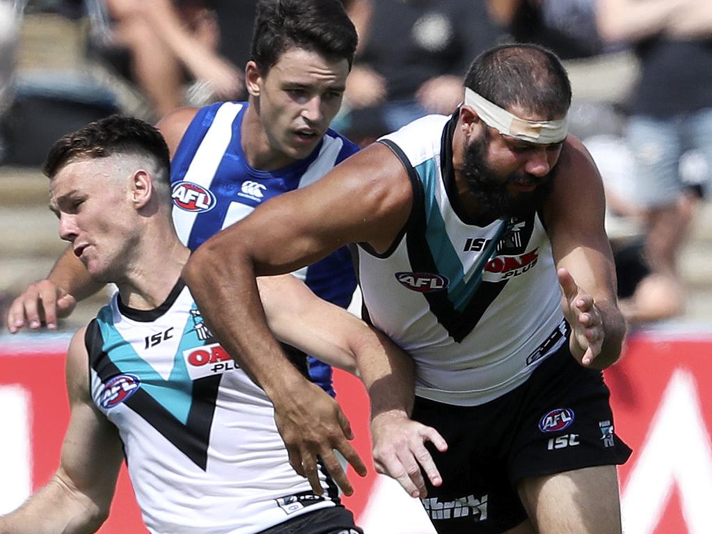 AFL - 09/03/19 - JLT - Port Adelaide v North Melbourne at Alberton Oval. Paddy Ryder and Robbie Gray Collide causing Ryder to leave the ground. Picture SARAH REED