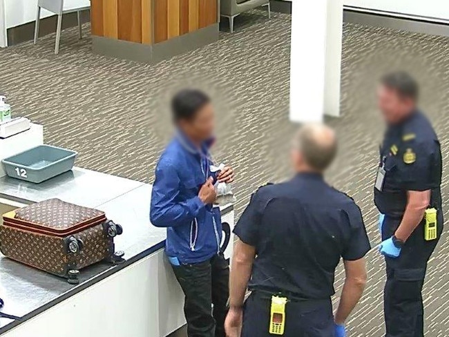 Van Ho Le is arrested at Adelaide Airport. Picture: Australian Border Force