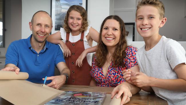 Angela and Ben Gray, pictured with children Sienna and Parker, are saving money this Christmas. Picture Dean Martin