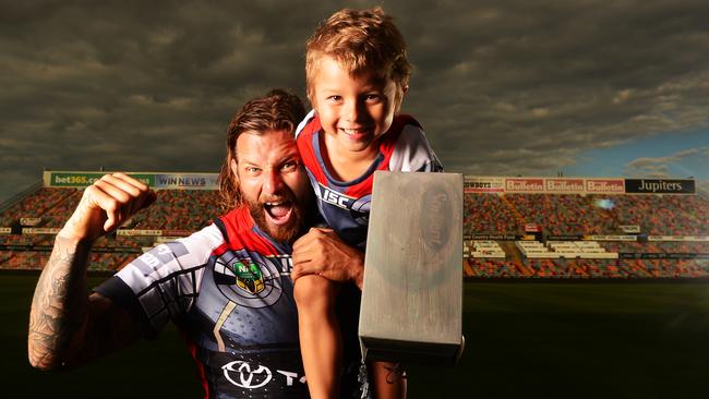 Ashton Sims with son Kobi in their Thor jerseys in 2014.