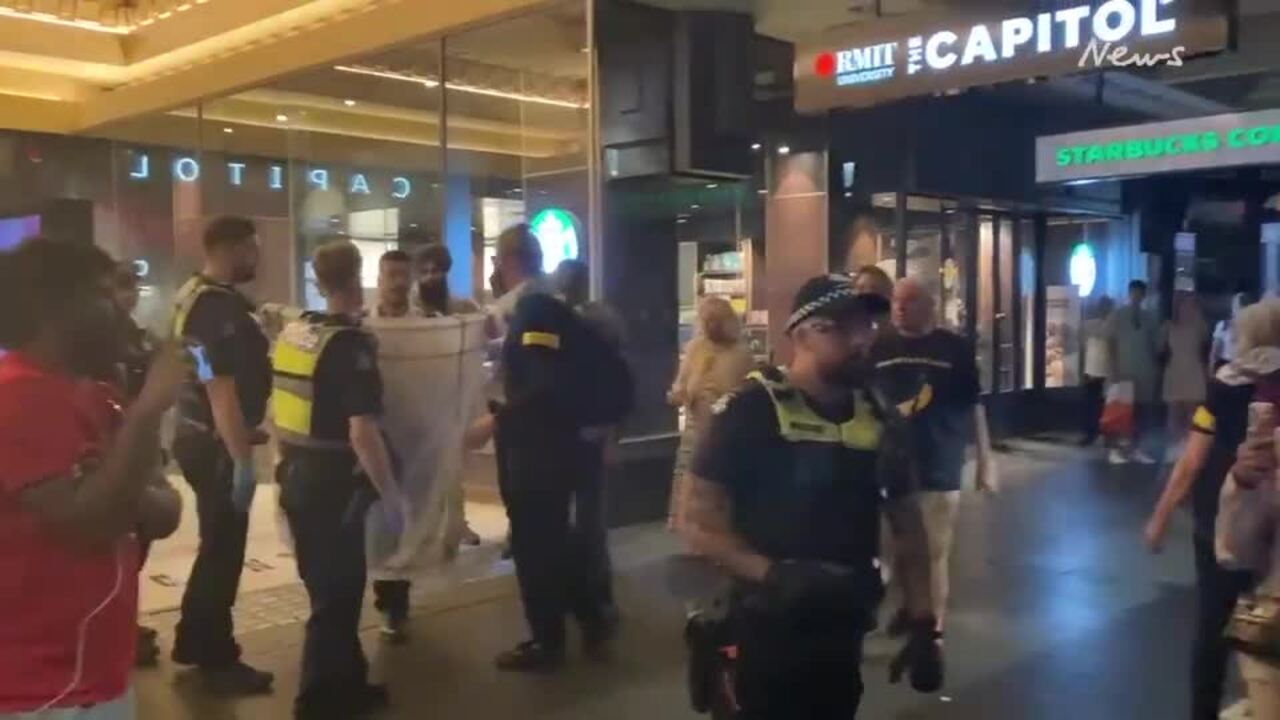 Protesters gather outside Melbourne Town Hall