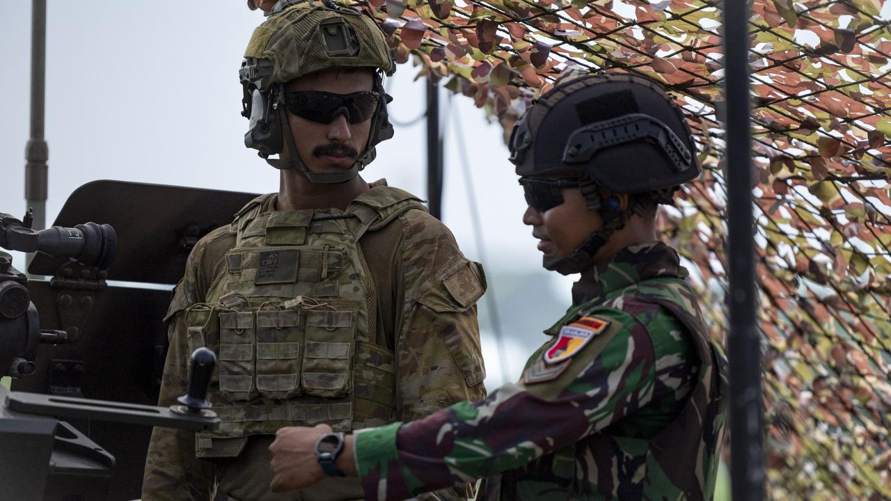 An Australian Army gunner from 4th Regiment, Royal Australian Artillery prepares to fire an Indonesian Armed Forces KH187 Howitzer in a live-fire fire mission during Exercise Keris Woomera 2024 in East Java, Indonesia. PHOTO: LCPL Riley Blennerhassett