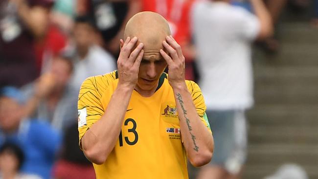 Australia's Aaron Mooy reacts after Peru score their 2nd goal during their final FIFA World Cup group match at Fisht Stadium during the FIFA 2018 World Cup in Sochi, Russia, Tuesday, June 26, 2018. (AAP Image/Dean Lewins) NO ARCHIVING