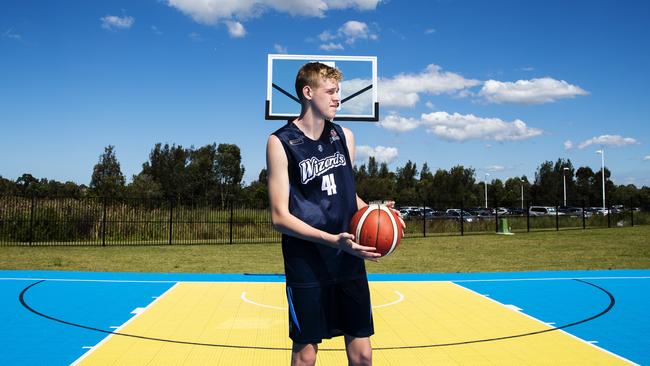 Seven Foot 14 year old Rocco Zikarsky is a rising basketball and swimming sensation that has already been identified as a future NBA prospect and has been signed up with the AIS. Picture: Lachie Millard