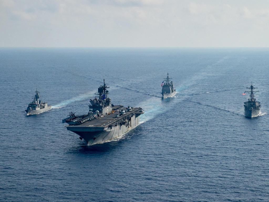 Royal Australian Navy helicopter frigate HMAS Parramatta conducts officer of the watch manoeuvres with amphibious assault ship USS America. Picture: Department of Defence