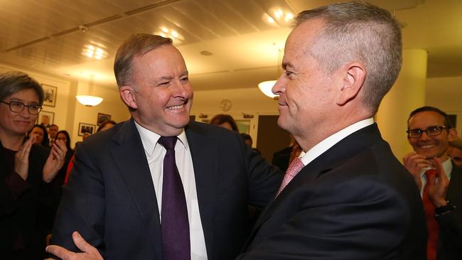 Bill Shorten (right) and congratulates new Opposition Leader Anthony Albanese. Picture Kym Smith