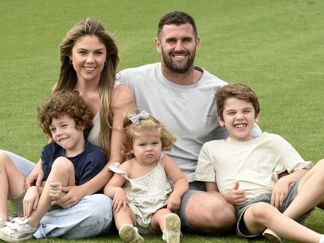 Jack Darling with his wife Courtney and kids Leo (six), Rosie (one) and Max (seven) at Arden Street ahead of his 300th AFL game on Sunday. Picture: Andrew Henshaw