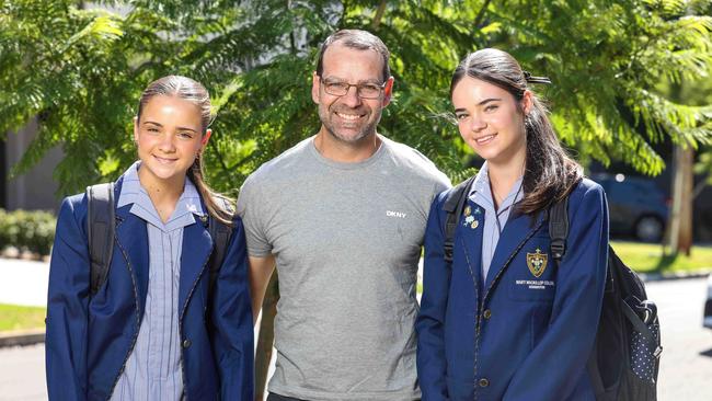 Anthony Martini and his daughters Ella, 12, and Ava, 15, who attend Mary MacKillop College. Picture: Russell Millard Photography