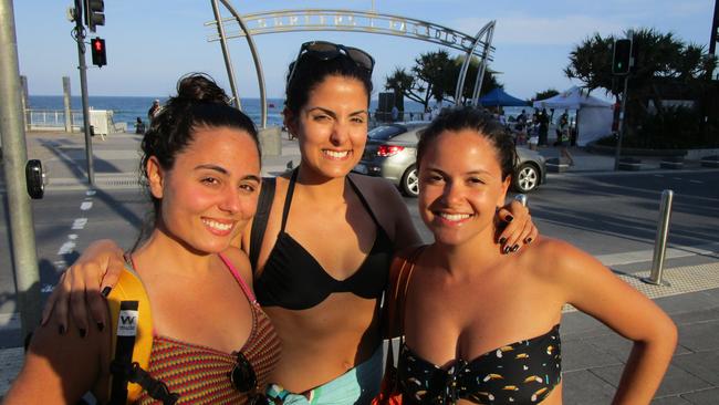 Brazilian tourists (from left) Luisa Galvao, Ana Bartolome and Camila Soluri on Cavill Mall after a surf lesson