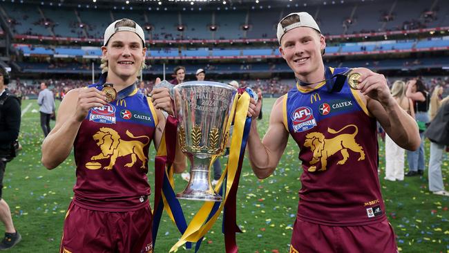 Will Ashcroft and Fletcher with the premiership Cup. (Photo by Daniel Pockett/AFL Photos/Getty Images)