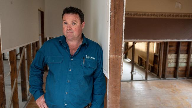 Luke Ryan (Real Estate) inside a house put up for sale but requiring hundreds of thousands of dollars in repairs. Picture: Jason Edwards