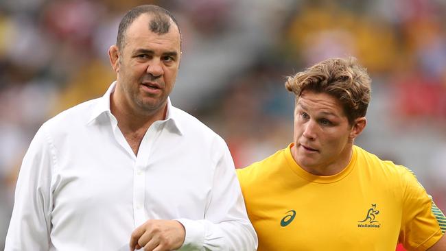 Michael Cheika with Wallaby captain Michael Hooper before the loss to Wales. Hooper accepted refereeing decisions went both ways. Cheika not so much. Picture: Mark Kolbe/Getty Images