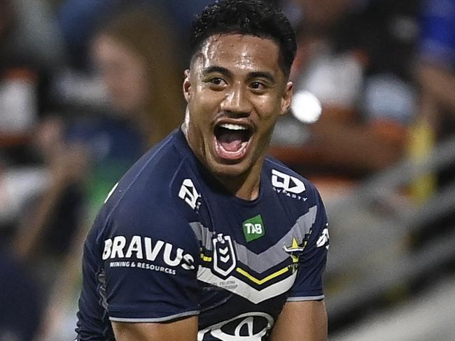 TOWNSVILLE, AUSTRALIA - JULY 01: Murray Taulagi of the Cowboys celebrates after scoring a try  during the round 18 NRL match between North Queensland Cowboys and Wests Tigers at Qld Country Bank Stadium on July 01, 2023 in Townsville, Australia. (Photo by Ian Hitchcock/Getty Images)