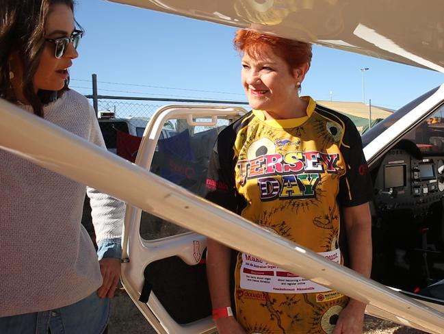 Pauline Hanson slept under the wings of the two-seater plane she arrived in. She’s wearing a jersey because it’s ‘Jersey Day’ for organ donation. Picture: Lulu Freedman