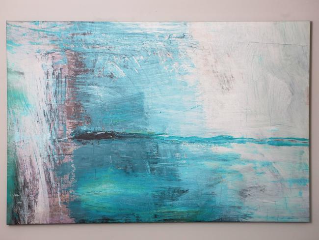 Painting: I like the combination of this painting, the clock and the candle. I love the beach and blue and white are my favourite colours. It’s a happy canvas.