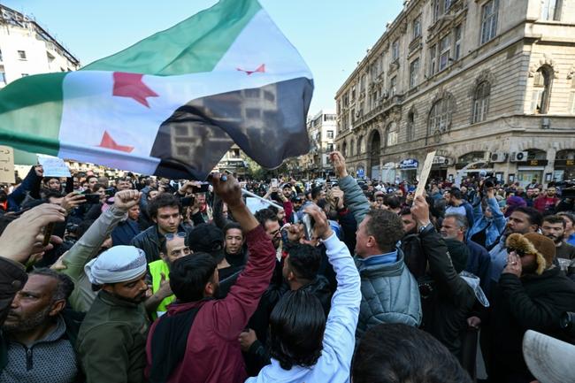 Syrians rally in Damascus to protest mass killling in coastal provinces, in the deadliest violence since Assad's overthrow