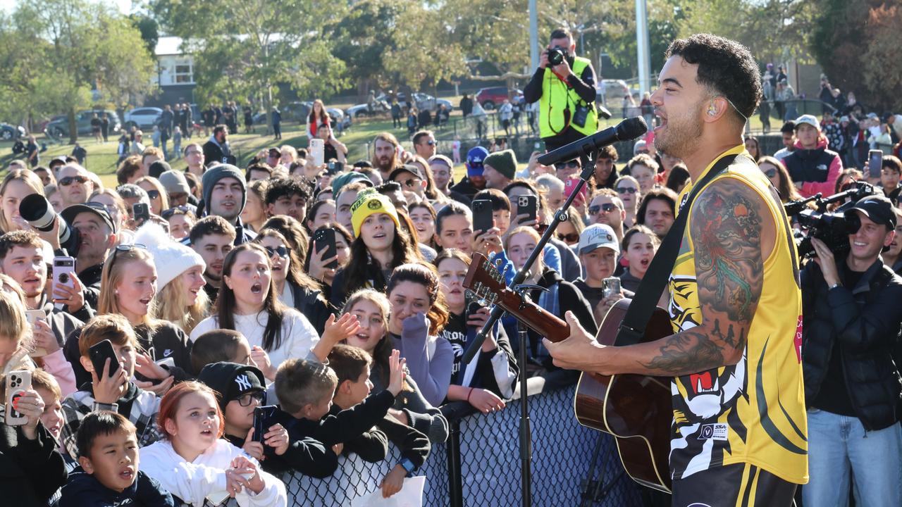 Guy Sebastian sings to the crowd at the struggling VAFA side Masala Thirds. Picture: David Crosling