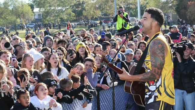Guy Sebastian sings to the crowd at the struggling VAFA side Masala Thirds. Picture: David Crosling