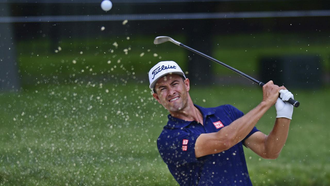 Adam Scott, from Australia, hits out of a sand trap on the eighth hole during the first round of the Memorial golf tournament Thursday, May 30, 2018, in Dublin, Ohio. (AP Photo/David Dermer)