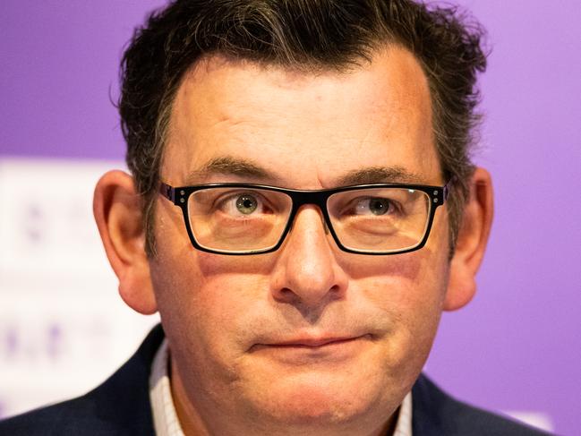 MELBOURNE, AUSTRALIA - SEPTEMBER 25: Victorian Premier Daniel Andrews reacts during his press conference on September 25, 2020 in Melbourne, Australia. Victoria has recorded 14 new coronavirus cases and eight deaths in the past 24 hours. Metropolitan Melbourne remains under stage 4 lockdown restrictions, with people only allowed to leave home to give or receive care, shopping for food and essential items, daily exercise and work while an overnight curfew from 8pm to 5am is also in place. The majority of retail businesses are also closed. Other Victorian regions are in stage 3 lockdown. The restrictions, which came into effect from 2 August, were introduced by the Victorian government as health authorities work to reduce community COVID-19 transmissions across the state. (Photo by Asanka Ratnayake/Getty Images)