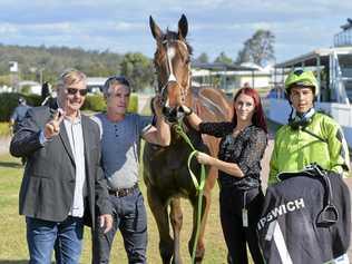 Connections of Animal Instinct, ridden by Jed Hodge, celebrate their win in the Nichols Finance Plate at Ipswich racetrack. Picture: Cordell Richardson