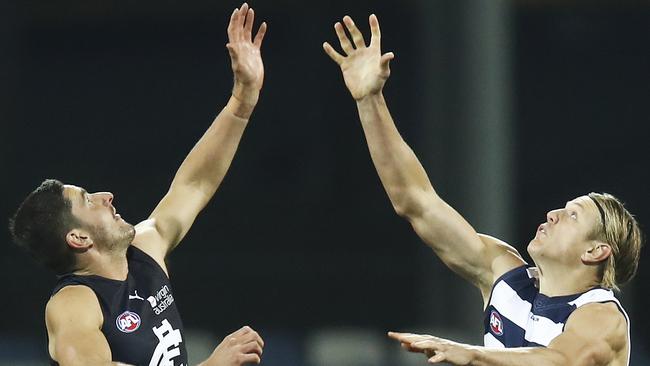 Marc Pittonet takes on Geelong’s Rhys Stanley. Picture: Getty Images