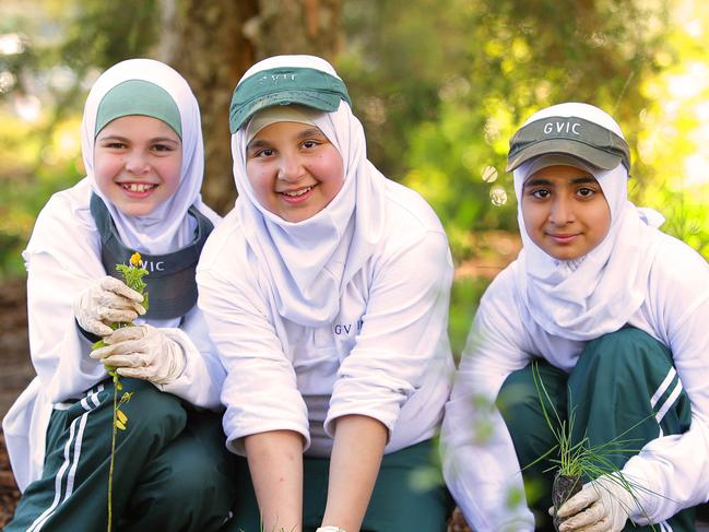 Maryam El-Abdallah , Bader El-Neamkawasse, Ayaat Mahamad. One tree per child campaign.  students from Green Valley Islamic College planting trees as part of the NewsLocal campaign.