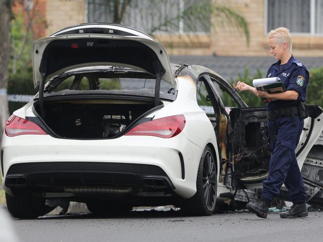 The burnt out Mercedes police believe was driven by the gunman last week. Picture Craig Greenhill