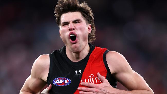 MELBOURNE, AUGUST 4, 2024: 2024 AFL Football - Round 21 - Essendon Bombers V Fremantle Dockers at the MCG. Sam Durham of the Bombers kick a point to seal the win, Picture: Mark Stewart