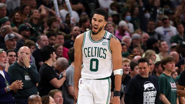 MILWAUKEE, WISCONSIN - MAY 13: Jayson Tatum #0 of the Boston Celtics reacts to a three point shot against the Milwaukee Bucks during the second half of Game Six of the Eastern Conference Semifinals at Fiserv Forum on May 13, 2022 in Milwaukee, Wisconsin. NOTE TO USER: User expressly acknowledges and agrees that, by downloading and or using this photograph, User is consenting to the terms and conditions of the Getty Images License Agreement. (Photo by Stacy Revere/Getty Images)