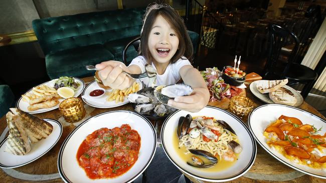 No kidding: Madison, 6, isn’t afraid of trying new foods, like oysters. Picture: David Caird