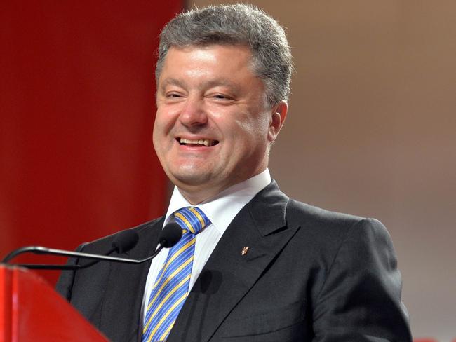 Success: Petro Poroshenko claims victory in Ukraine presidential election. AFP PHOTO / SERGEI SUPINSKY