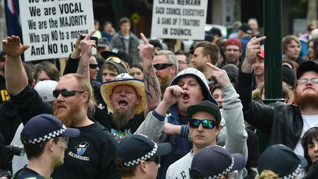 UPF protesters shout at the protest. Picture: Jake Nowakowski